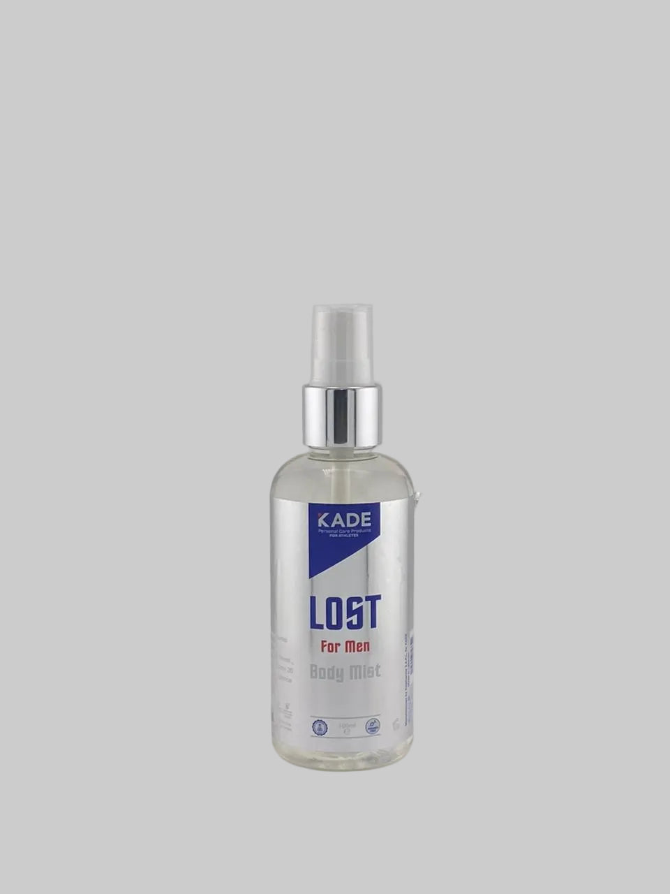Bottle of KADE Lost for Men body mist on a white surface with a gray background